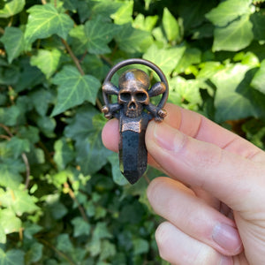 Skull and Bones Pirate Relic pendant with Smoky Quartz Crystal